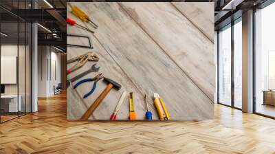 Screwdriver,hammer,tape measure and other tool for construction tools on rustic wooden background with copy space,industry engineer tool concept.still-life. Wall mural