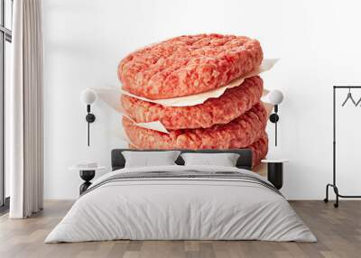 Stack of raw burger patties on white background Wall mural