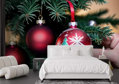 Putting A Christmas Bauble In A Christmas Tree At 27-9-2024 Wall mural