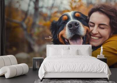 Woman Hugging Happy Bernese Mountain Dog Outdoors
 Wall mural