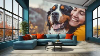 Woman Hugging Happy Bernese Mountain Dog Outdoors
 Wall mural