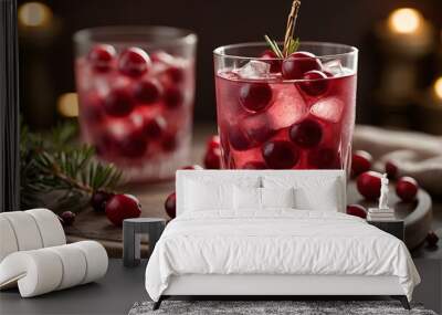 chilled cranberry soda in a glass with ice cubes and fresh cranberries Wall mural