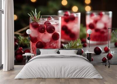 chilled cranberry soda in a glass with ice cubes and fresh cranberries Wall mural