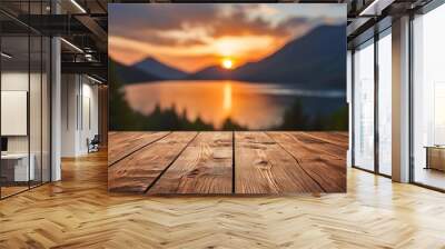 empty wooden table with blurred bokeh sunset view of mountain landscape in background Wall mural