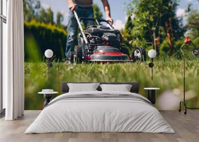 Mowing the lawn in a sunlit garden Wall mural