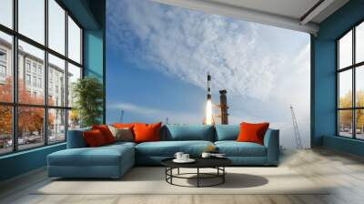 panoramic view of the sky behind a space rocket on the launch pad Wall mural