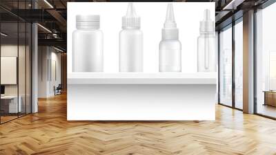 Cosmetic bottles on shelf. Beauty products empty packaging. Blank containers for liquid lotions and shampoos, moisturizers on white background. Medicine blank bottle for pills on pharmacy shop shelves Wall mural