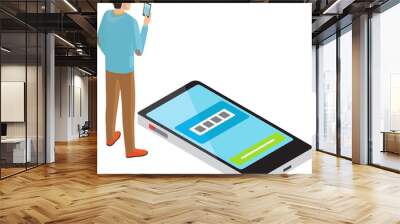 Man stands uses smartphone, browsing or chatting, texting or watching videos. Vector male character with phone checks charge of phone. Person with cellphone, guy communicating by mobile gadget Wall mural