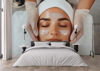 Woman in a spa getting face rejuvenation treatment Wall mural