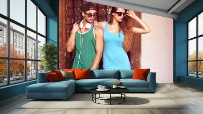 Close up portrait of happy smiling hipster couple in love. Weari Wall mural