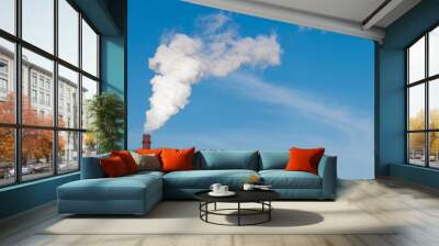 Industrial St. Petersburg - March 17, 2020 Smoking chimneys on the blue sky background. Heat station pipes, smoke. Wall mural