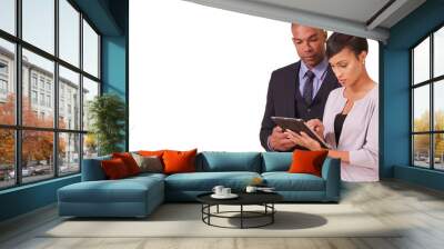 African American couple working in corporate business working on their tablet. Two black business professionals working on their pad on a white background Wall mural