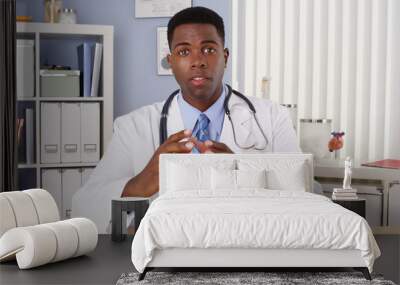 African American doctor talking to camera Wall mural