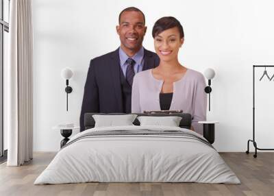 African American man and woman posing for a portrait on a white background. Black business couple holding a tablet on a blank backdrop Wall mural