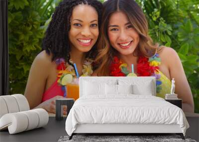 Black and Asian best friends enjoying tropical vacation together Wall mural