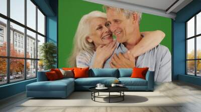 Closeup of happy elderly couple having a good time on green screen Wall mural