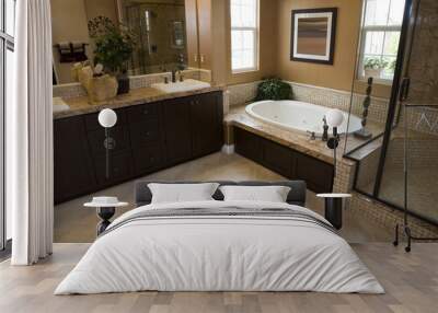 Spacious bathroom with a modern tub and tile floor. Wall mural