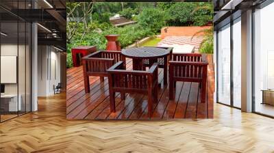 House patio with wooden table and chairs Wall mural