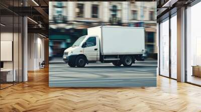 Street mock-up. White delivery van in motion on a busy city street, showcasing urban logistics and the pace of city life with blurred background for a sense of speed. Truck blind van mockup Wall mural