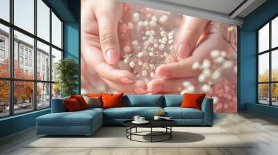 Female hands with pink nail design hold flowers generative ai Wall mural