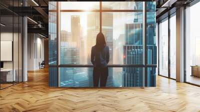 Successful businesswoman looking out of a large window overlooking the city generative ai Wall mural