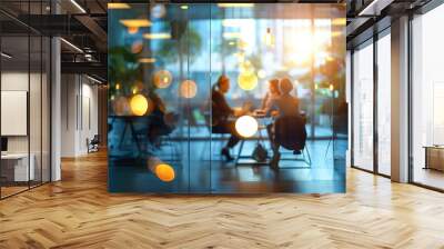 Business team having meeting in modern office with glassy blurred background with bokeh Wall mural