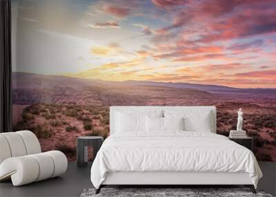 Sunset on desert landscape with a natural bridge in Southern Utah Wall mural