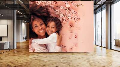 happy mother's day! Adorable sweet young afro-american mother with cute little daugh. Wall mural