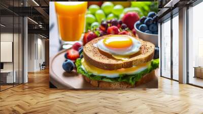 Top view of a nutritious breakfast with eggs on a board Wall mural