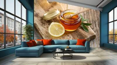 honey and lemon on a old wooden background Wall mural