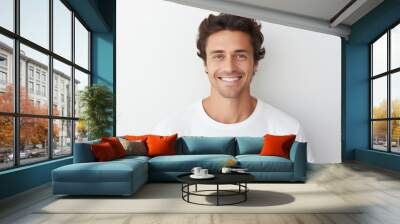 Portrait of handsome happy smiling young man with toothy smile looking at camera on white background Wall mural