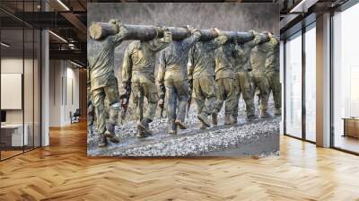 special forces military training carrying a big log. photograph detail with military equipment and a Wall mural