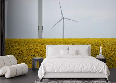 Wind turbines in a wind farm with a dramatic stormy sky in the background Wall mural