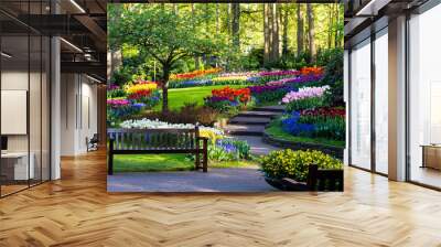 Tulip bloom in Keukenhof Flower Garden, the largest tulip park in the world. Colorful blooming fields and flower alleys, The Netherlands, Holland, Lisse, Europe.  Wall mural