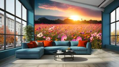 Beautiful and amazing cosmos flower field landscape in sunset Wall mural