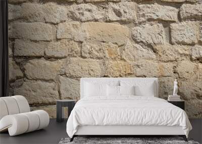 Old beige stone wall background texture Wall mural