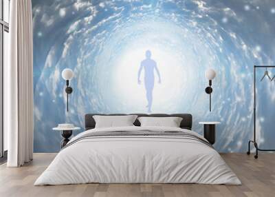 Tunnel of light with man figure Wall mural