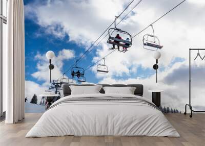 View of the chairlifts of the Morzine ski slopes in the French Alps during winter Wall mural