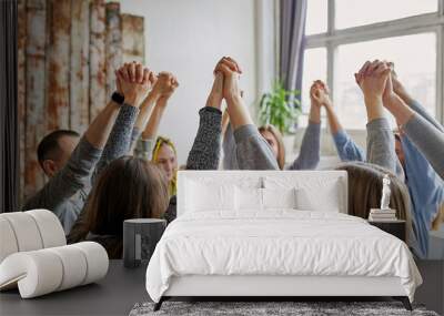 alcohol or drugs users at therapy meeting, people stand in the circle with raised hands. isolated Wall mural