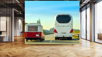 Camper and bus on road in Switzerland reflex Wall mural