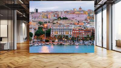 Cityscape with marina in Mediterranian sea Cagliari evening Wall mural