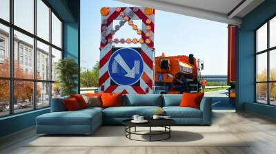 Truck carrying arrow down right reflective direction road sign Wall mural