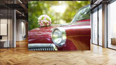 Wedding bouquet on vintage wedding car Wall mural