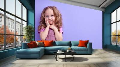 Close-up portrait of attractive lovely healthy glad cheerful girl enjoying good mood idea, solution, looking thoughtful, looking up, isolated on purple pastel color background. copy space Wall mural