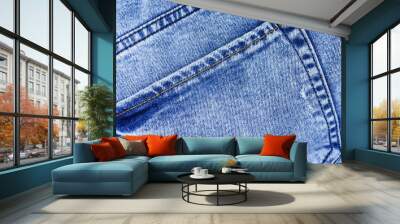 Denim background, close-up of jeans pockets. Faded jeans. Wall mural