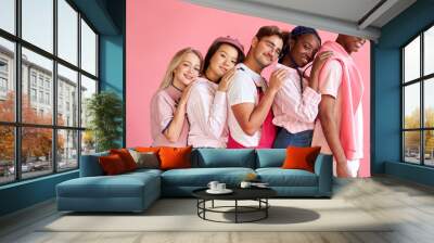 good-looking multi-ethnic group of youth leaned on each other, diverse people as one family Wall mural