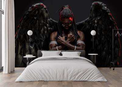 gorgeous and fantastic dark angel having big black wings, african male with strong body stand in the flesh of angel, white strips on muscular hands and dreadlocks on head. isolated photoshot Wall mural