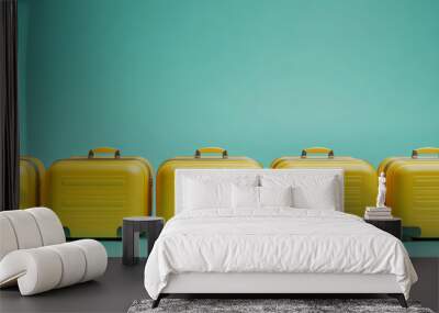 Many bright yellow suitcases on an isolated background Wall mural