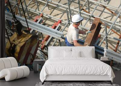 construction worker with steel beam Wall mural