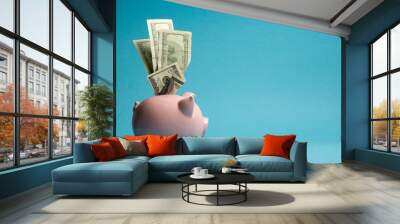 Piggy bank and dollar cash money. Business, finance, investment, saving and corruption concept. Wall mural